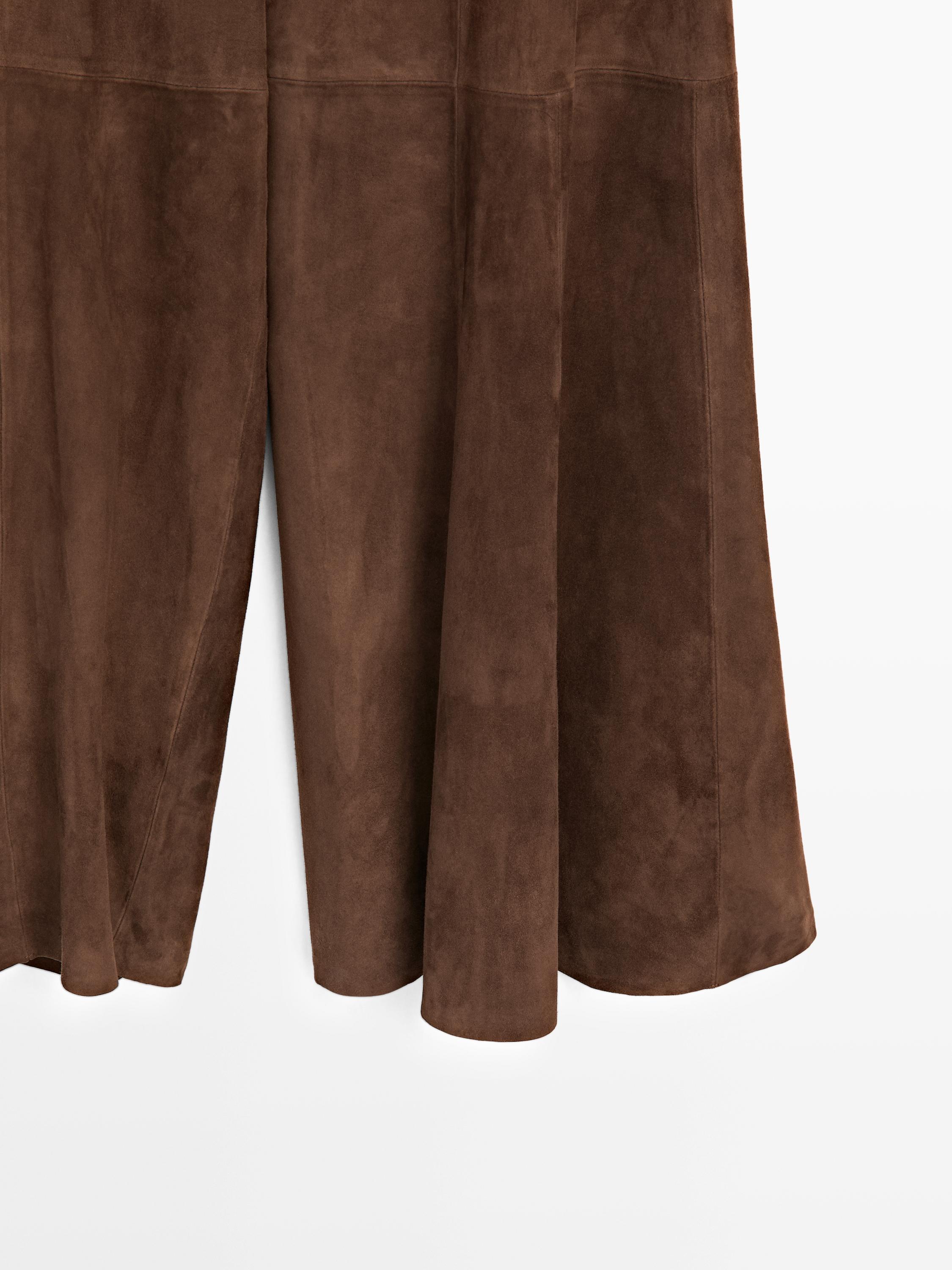 Pantalon évasé en cuir finition daim